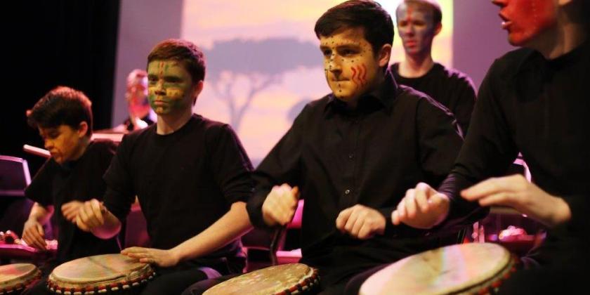 Pupils playing African drums at Springfest workshop