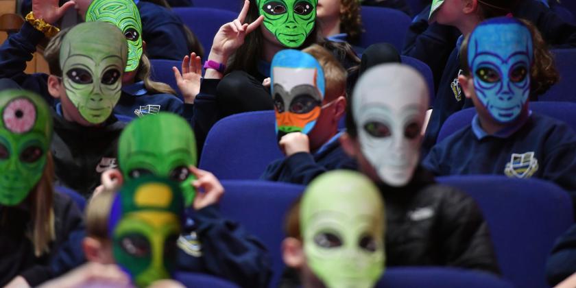 Pupils with Masks enjoying interactive Springfest roadshow