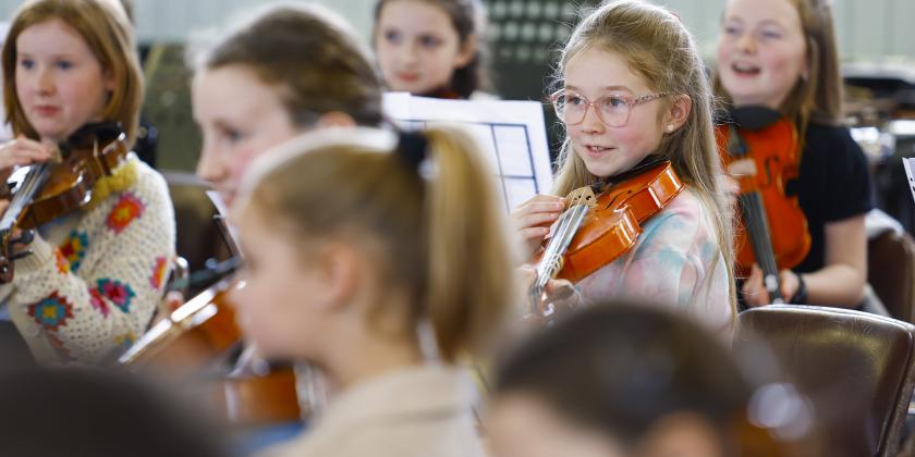 Young string orchestra members
